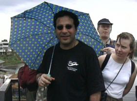 Jules van Hessen, Marcel Dohmen and Ciska Batterink in the pouring rain