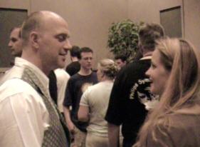 Roeland Duijne trying to corrupt Inge vd Weerd to trade her violin for a cello.